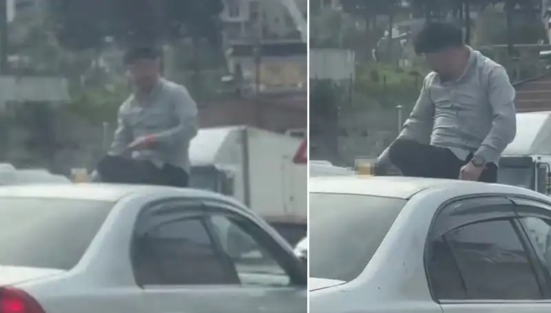 Trafikte Yılın Olayı: Otomobil Üzerinde Alem Yapanlar Şaşkınlık Yarattı